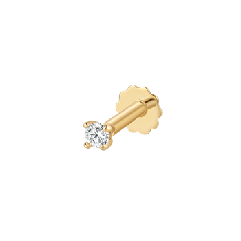 Guld labret piercing med klar, rund sten i prong-indfatning og flad, rund skive som bagstykke.
